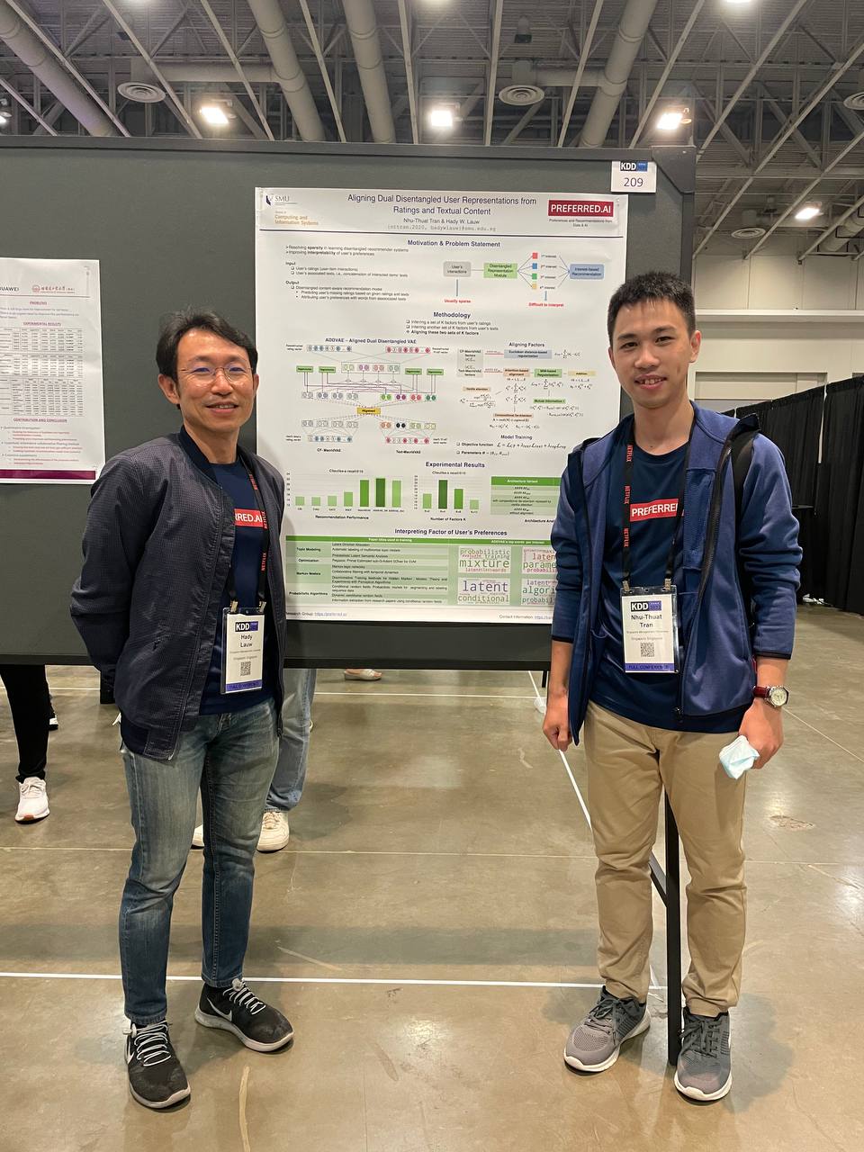 Hady and Thuat at the poster session