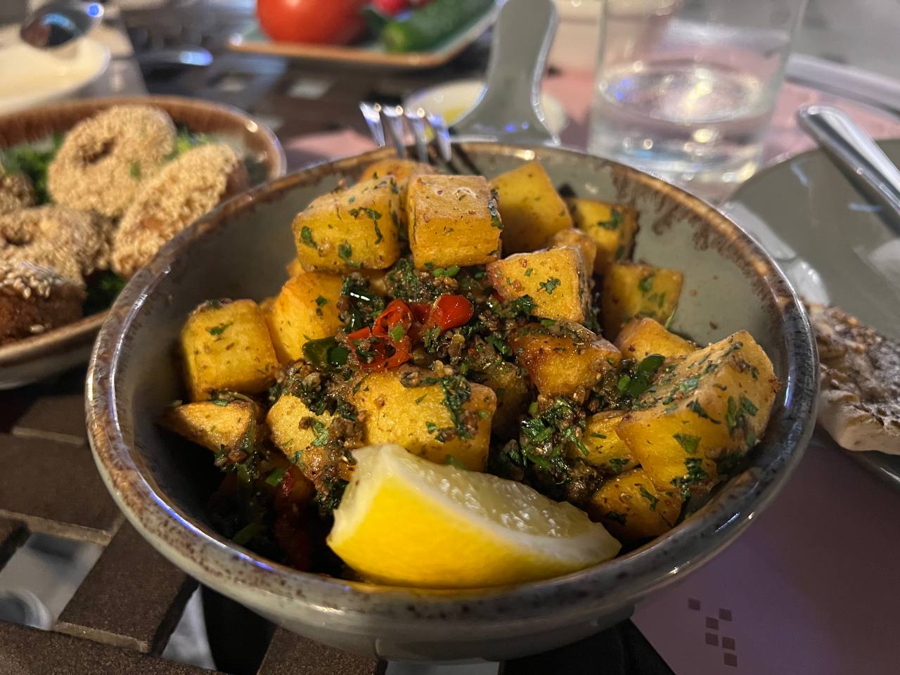 Batata Harra, arabic for “spicy potato” and Lebanese in origin, is a truly amazing dish.