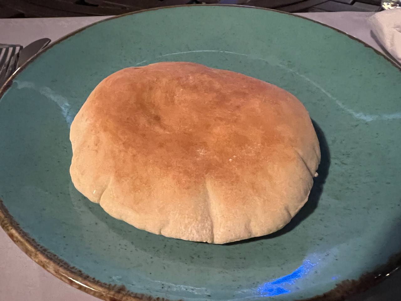 Pitta Bread, a staple in middle eastern meals, very versatile and can be paired with many dishes.