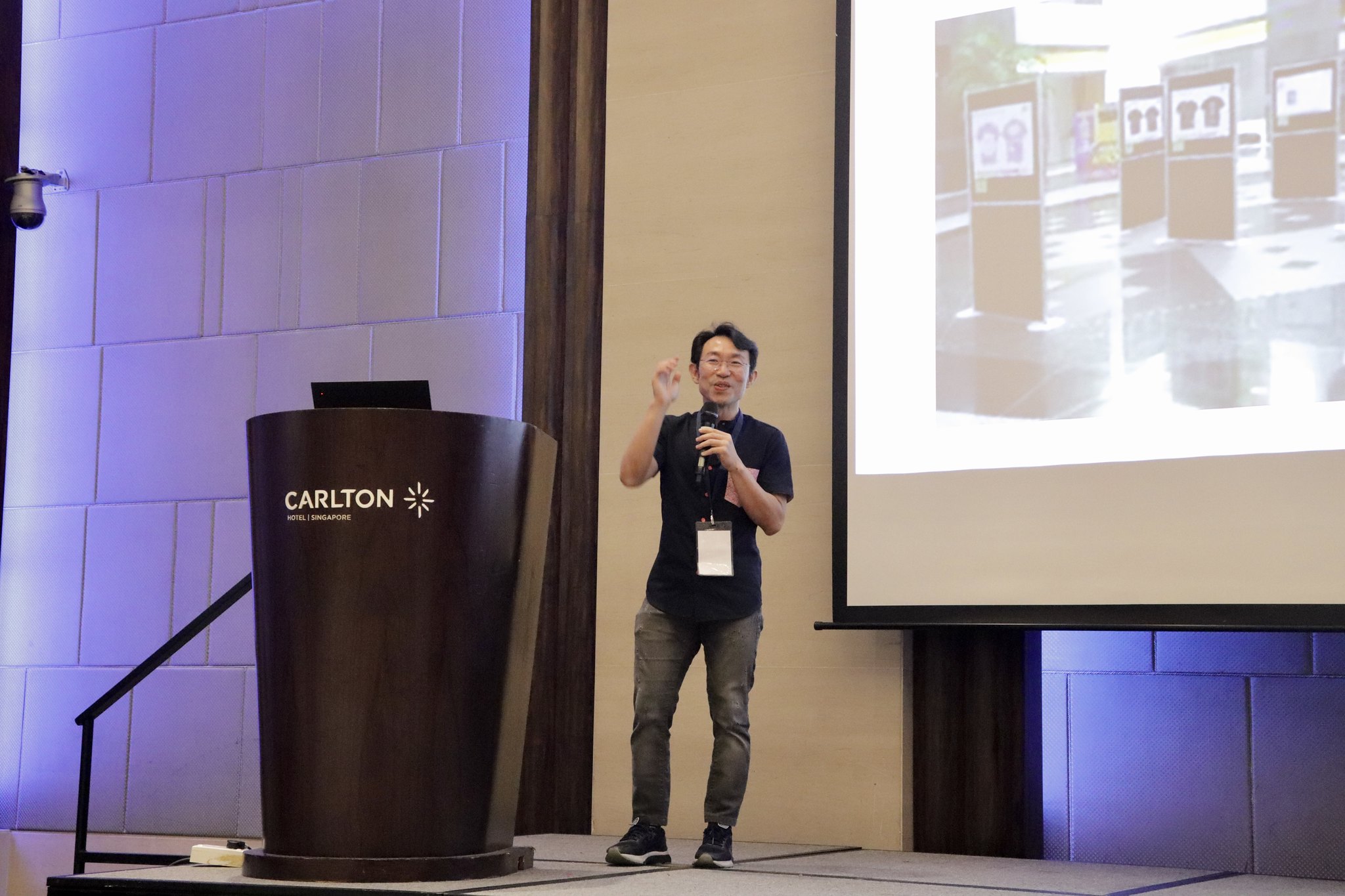 Hady making announcements during the conference