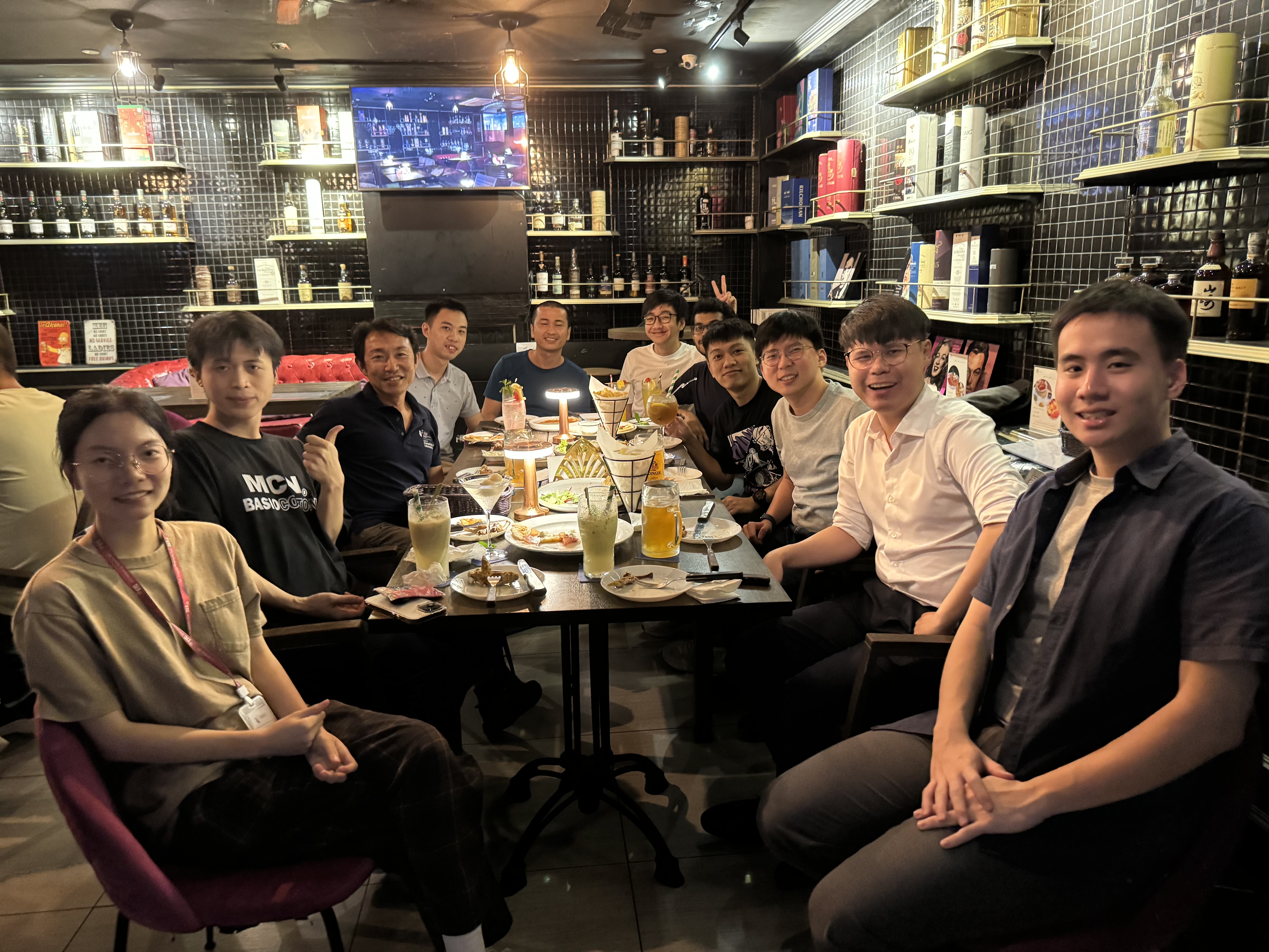 Group celebration at Pemenco CHIJMES after the defense (Ween in white shirt, second from right)